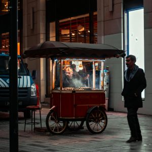 chestnut seller in street at night