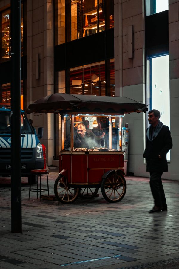 chestnut seller in street at night